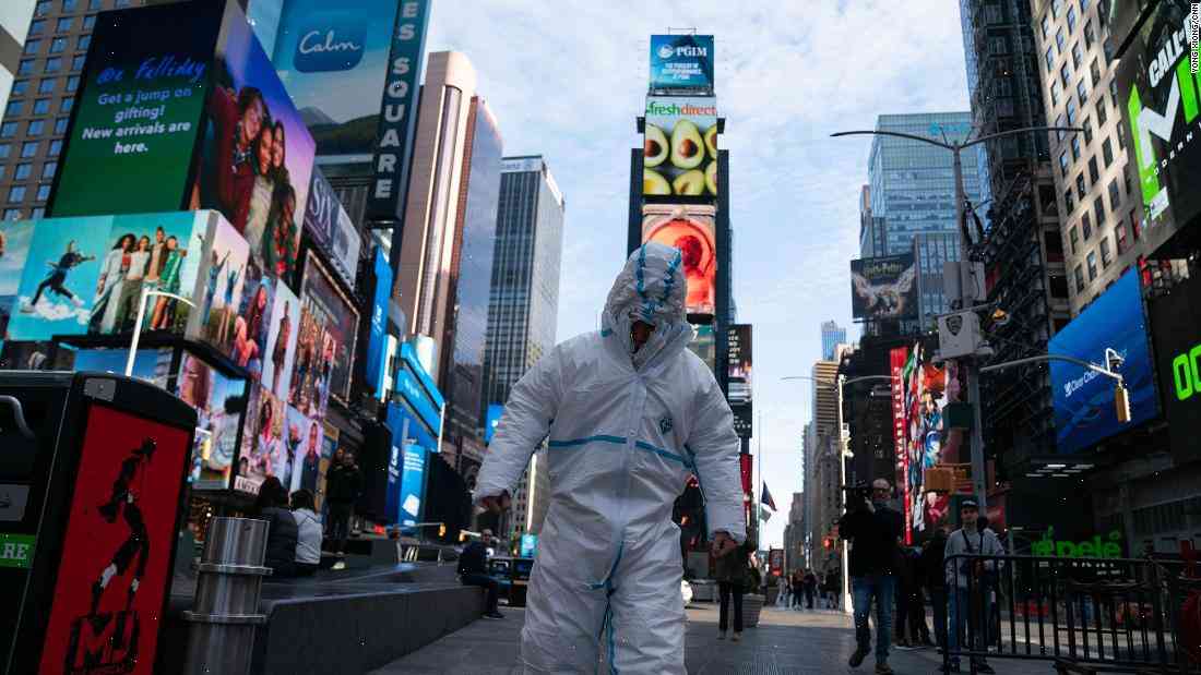 Chinese artist caught wearing 27 hazmat suits in Times Square